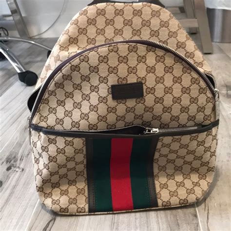 how to tell if it's fake gucci|knockoff used Gucci purses handbags.